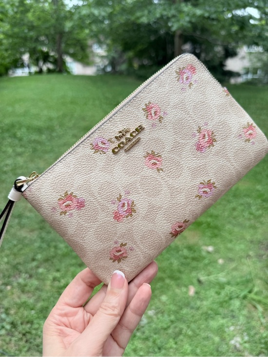 Coach Handbags - Coach large corner zip wristlet in signature canvas in floral print